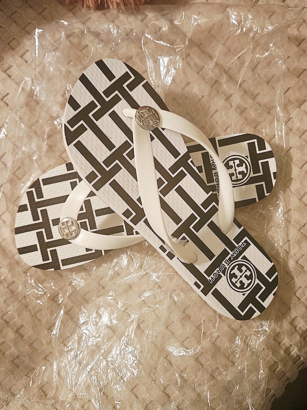 Tory Burch White Strappy Flip Flops with Black Geometric Print & Silver Logo